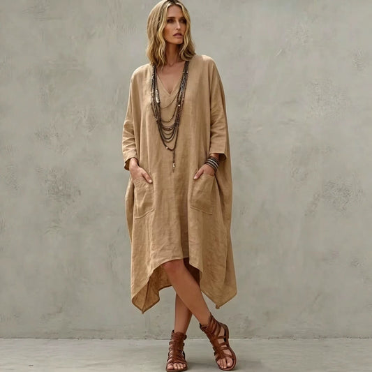 Robe midi en lin mélangé à col en V, manches 3/4, ourlet irrégulier et poches latérales