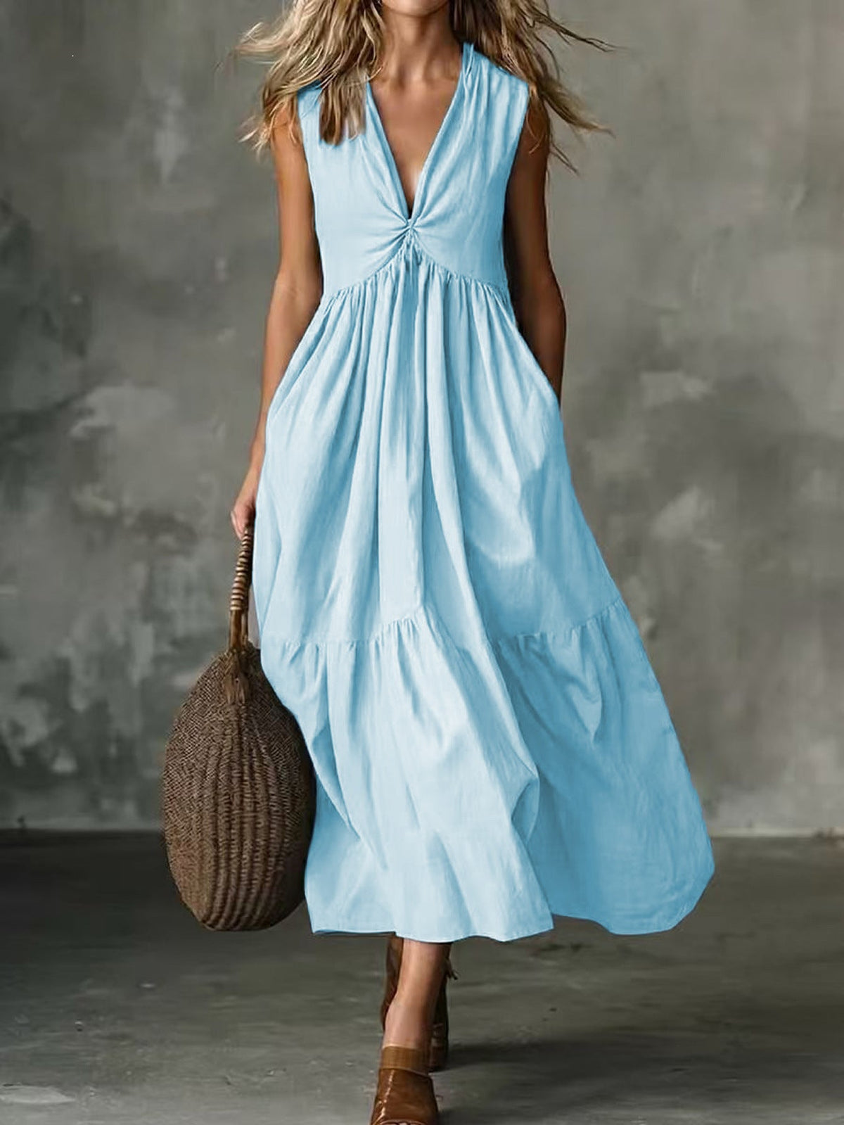 Robe longue texturée ample sans manches à col en V et devant torsadé avec poches