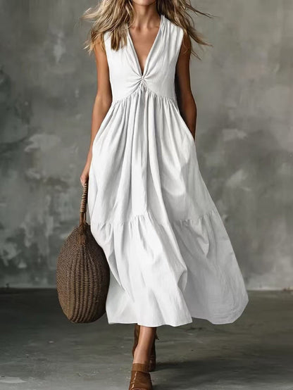 Robe longue texturée ample sans manches à col en V et devant torsadé avec poches