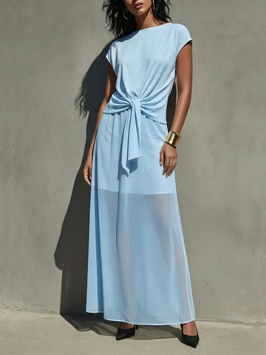 Robe longue élégante semi-transparente torsadée blanche