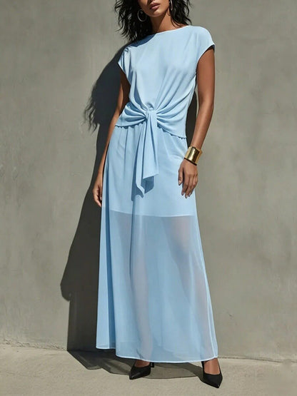 Robe longue élégante semi-transparente torsadée blanche