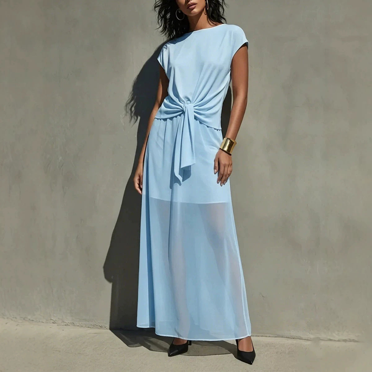 Robe longue élégante semi-transparente torsadée blanche