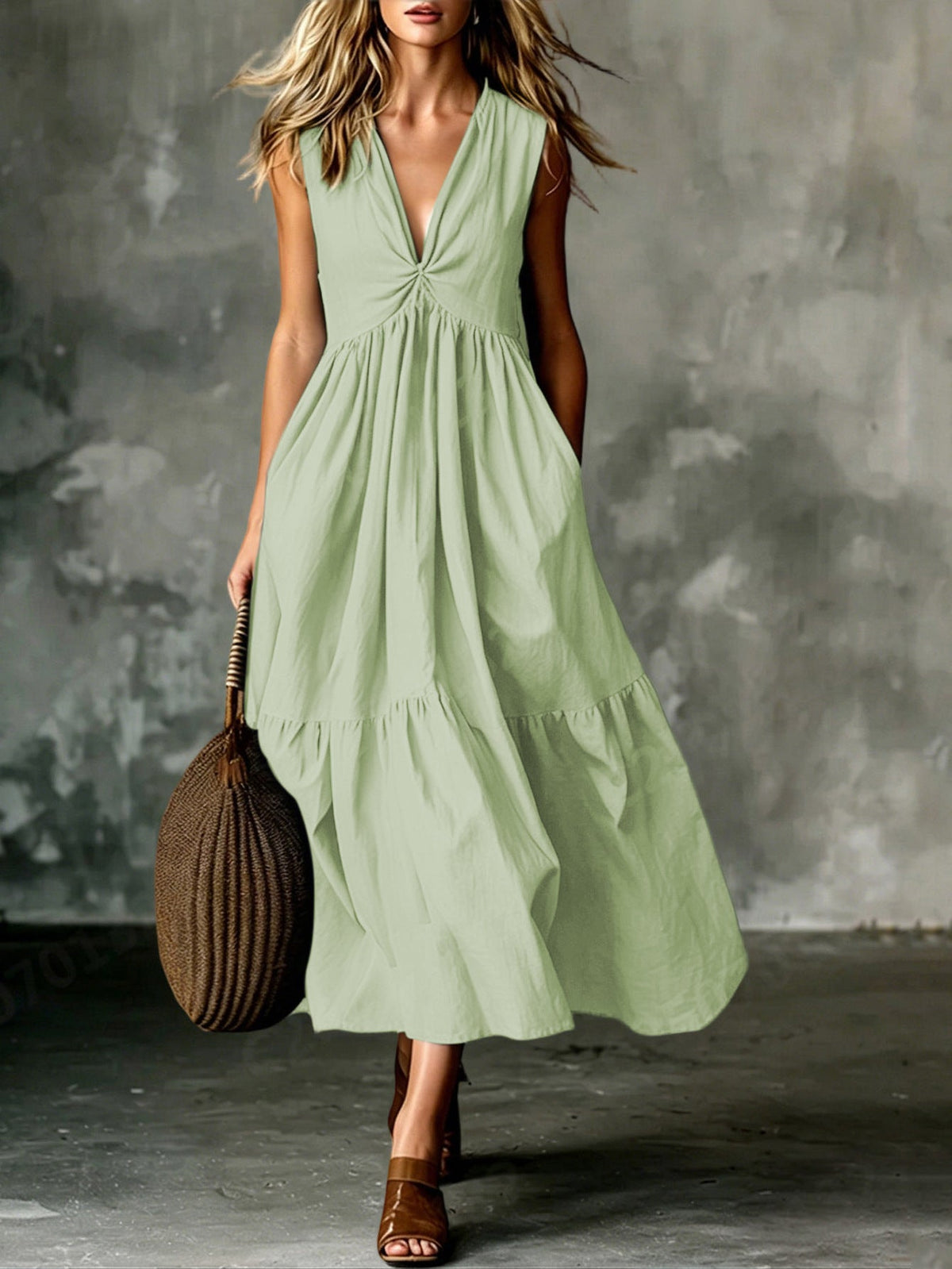 Robe longue texturée ample sans manches à col en V et devant torsadé avec poches