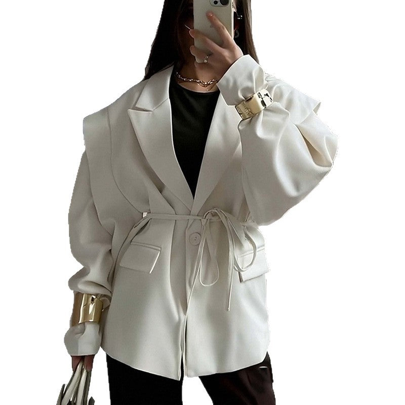 Blazer oversize ceinturé à manches bouffantes – Une élégance moderne et sophistiquée