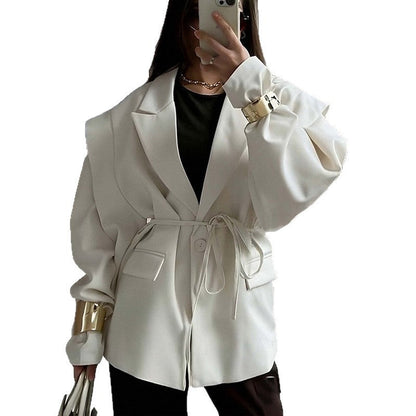 Blazer oversize ceinturé à manches bouffantes – Une élégance moderne et sophistiquée