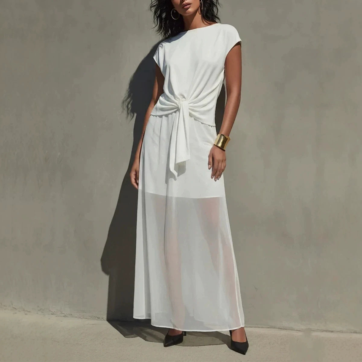 Robe longue élégante semi-transparente torsadée blanche