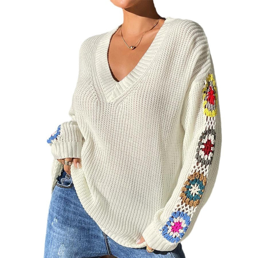 V-neck jumper with crochet flowers