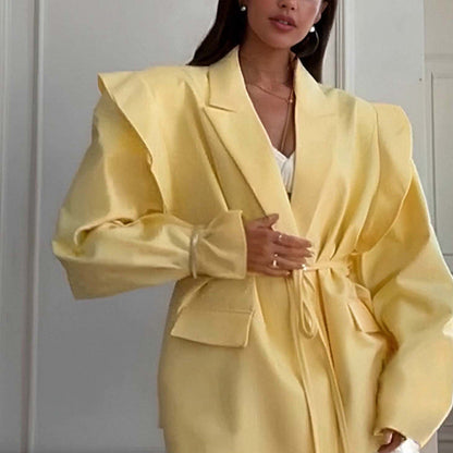 Blazer oversize ceinturé à manches bouffantes – Une élégance moderne et sophistiquée