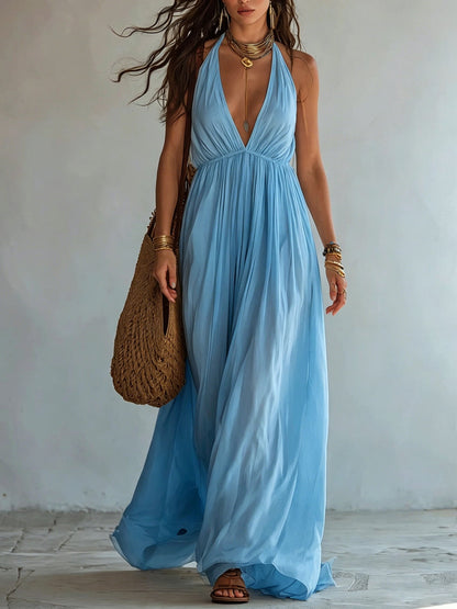 Robe longue en mousseline fluide avec col licou, décolleté en V profond et taille empire froncée