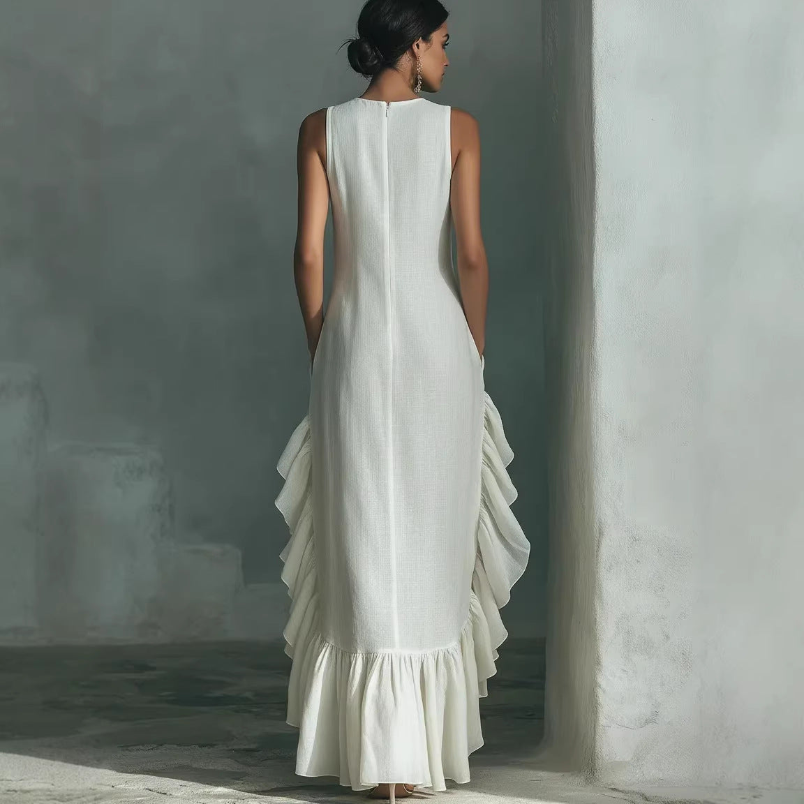 Longue robe maxi sans manches en lin à volants