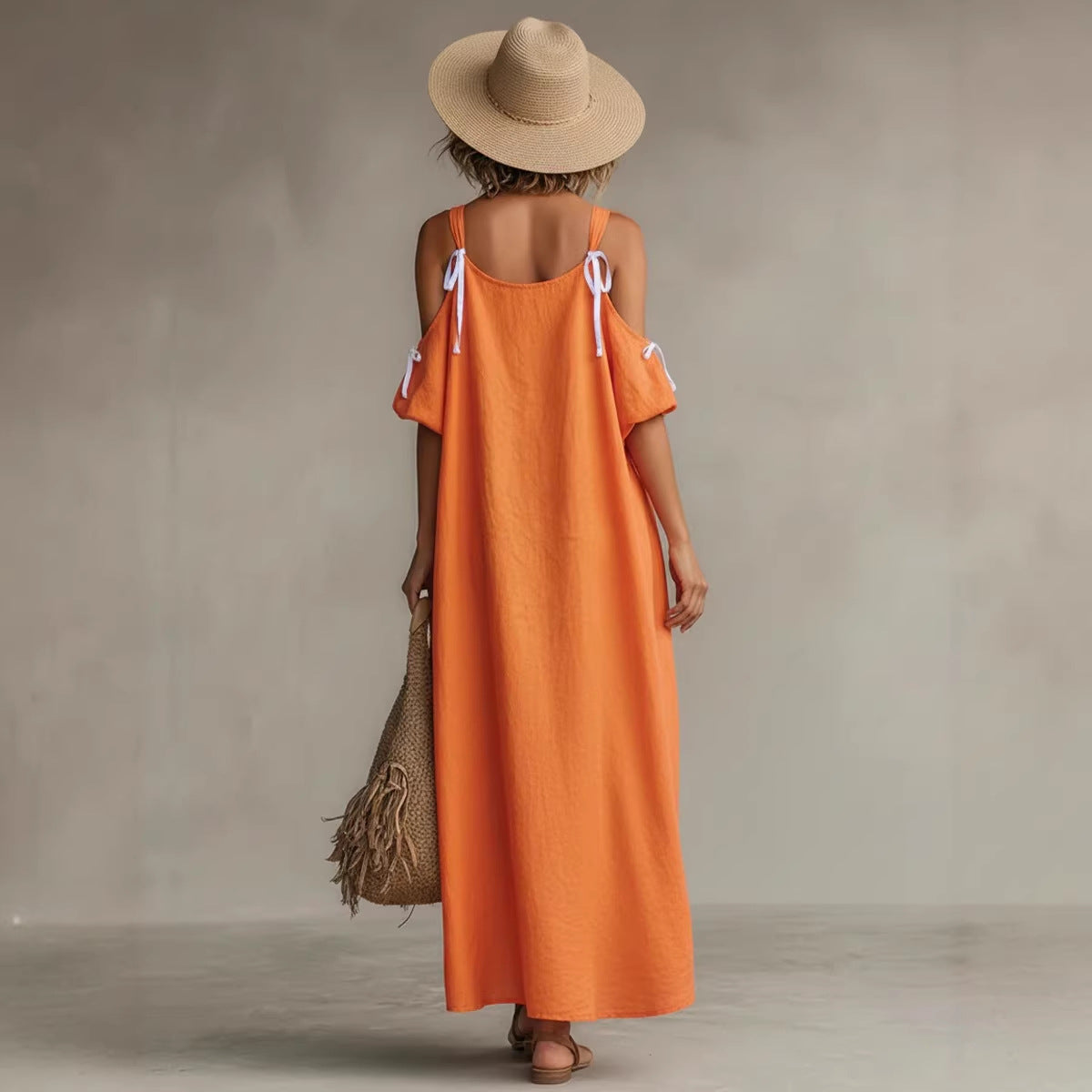 Robe longue asymétrique épaules dénudées orange vif