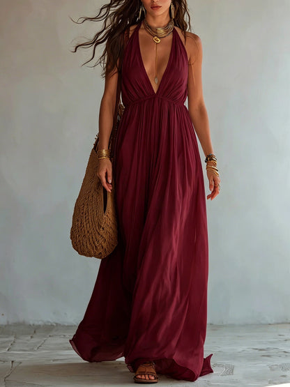 Robe longue en mousseline fluide avec col licou, décolleté en V profond et taille empire froncée