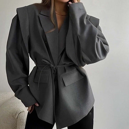 Blazer oversize ceinturé à manches bouffantes – Une élégance moderne et sophistiquée
