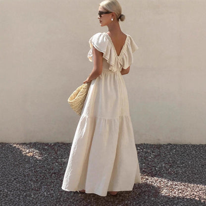 Robe longue maxi femme à col en V, manches volantées, coupe ample et étagée, idéale pour les vacances d'été.