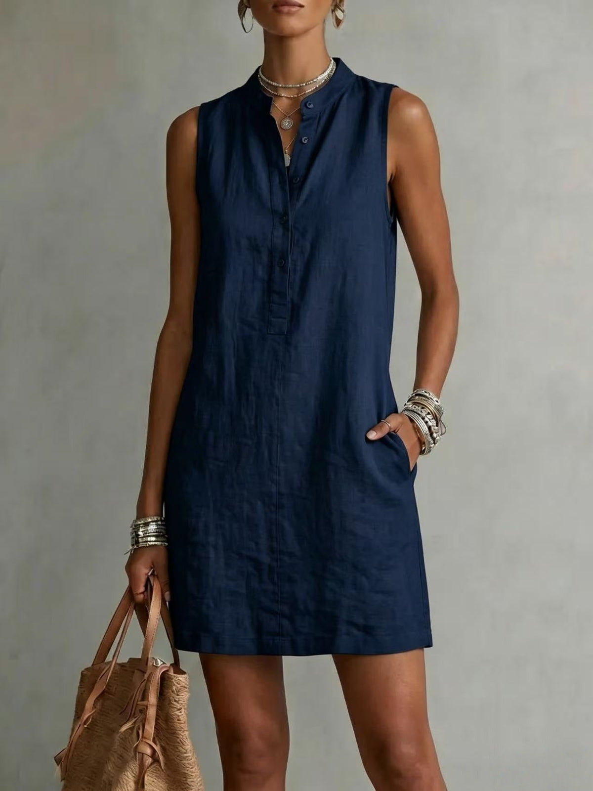 Mini-robe sans manches boutonnée en lin