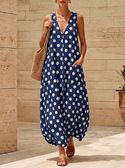 Robe midi sans manches vintage à pois et col en V avec poches latérales