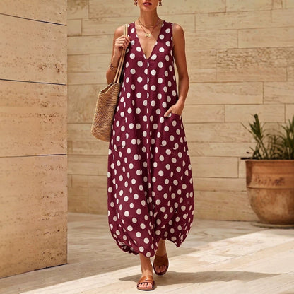 Robe midi sans manches vintage à pois et col en V avec poches latérales