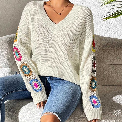 V-neck jumper with crochet flowers