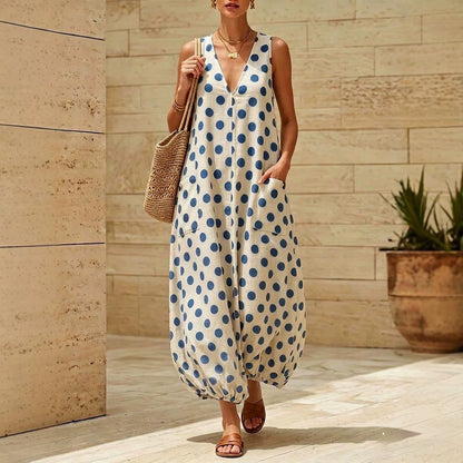 Robe midi sans manches vintage à pois et col en V avec poches latérales