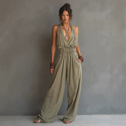 Combinaison pantalon dos nu décolleté en V, taille smockée et jambes larges palazzo