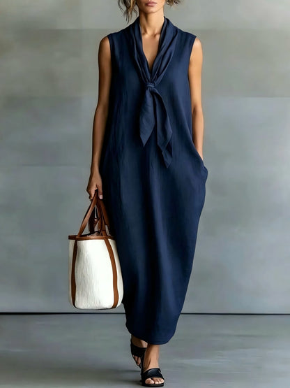 Robe trapèze mi-longue sans manches en lin beige naturel à nouer sur le devant