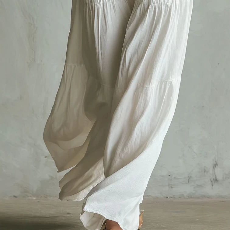 Combinaison-pantalon blanche smockée à jambes larges