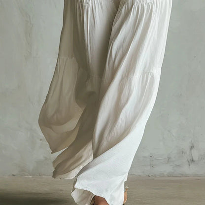 Combinaison-pantalon blanche smockée à jambes larges