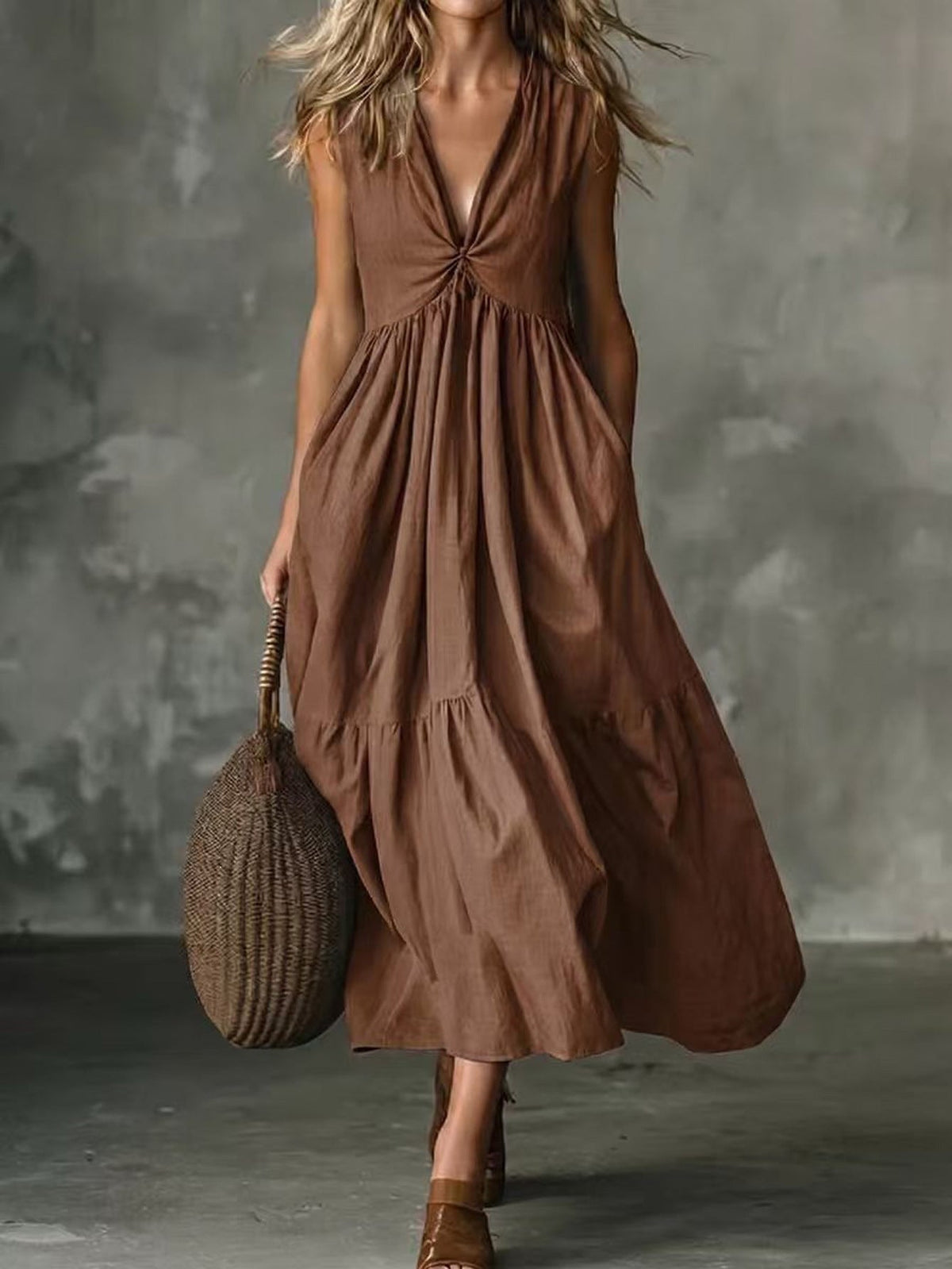 Robe longue texturée ample sans manches à col en V et devant torsadé avec poches