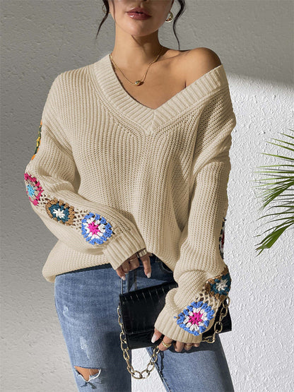 V-neck jumper with crochet flowers