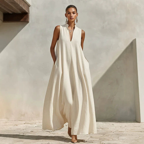 Robe longue ample sans manches en mélange de lin, avec col montant et poches