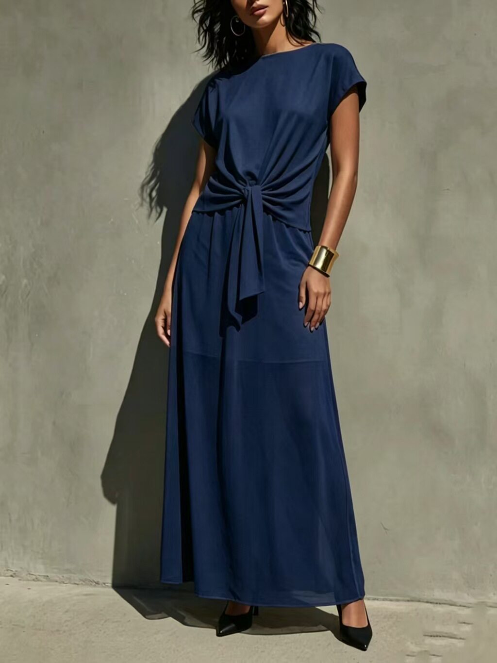 Robe longue élégante semi-transparente torsadée blanche