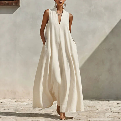 Robe longue ample sans manches en mélange de lin, avec col montant et poches