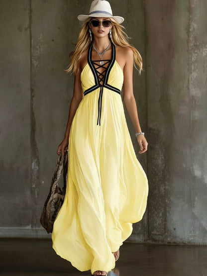 Robe longue en mousseline fluide bleu clair à col halter croisé