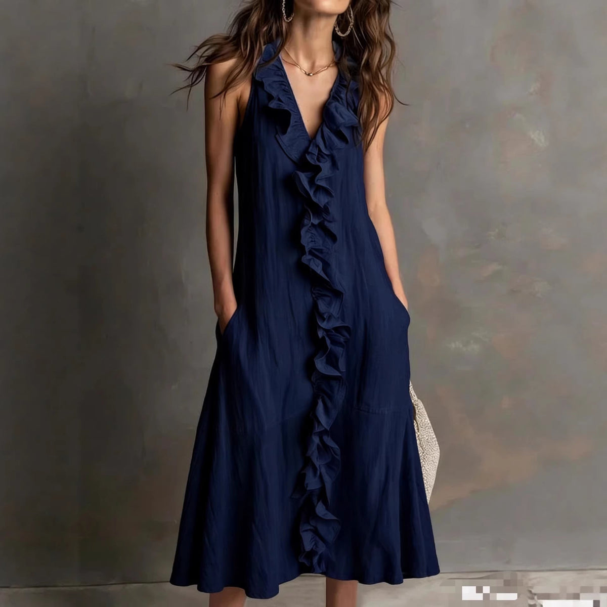 🌿 Robe midi sans manches à col en V volanté