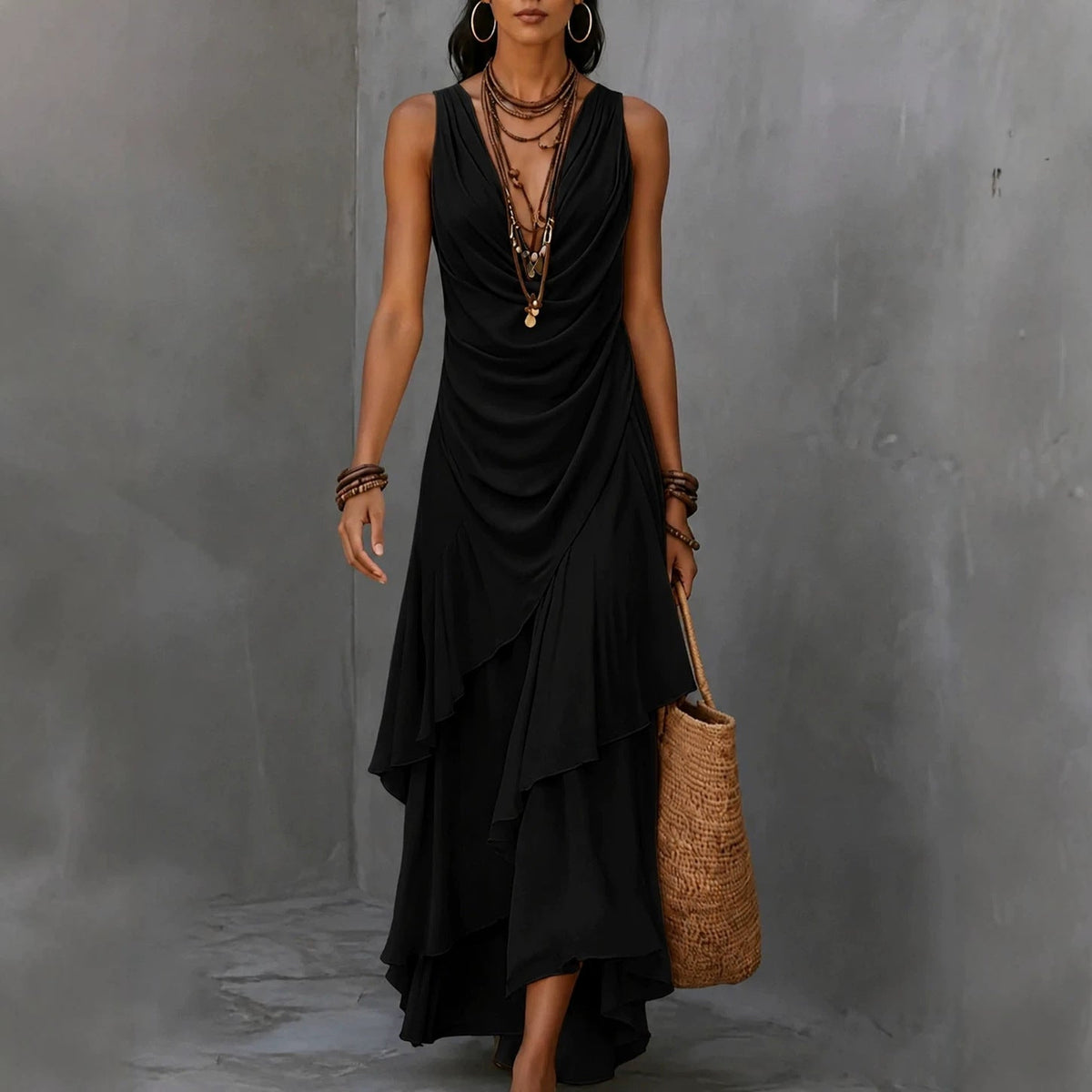 Robe longue asymétrique à volants, sans manches, avec col en V drapé