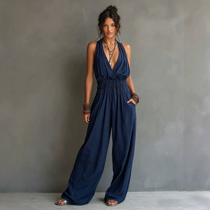 Combinaison pantalon dos nu décolleté en V, taille smockée et jambes larges palazzo
