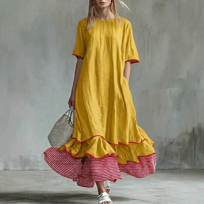 Robe longue ample en lin à rayures passepoilées et ourlet à volants