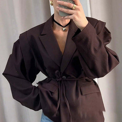 Blazer oversize ceinturé à manches bouffantes – Une élégance moderne et sophistiquée