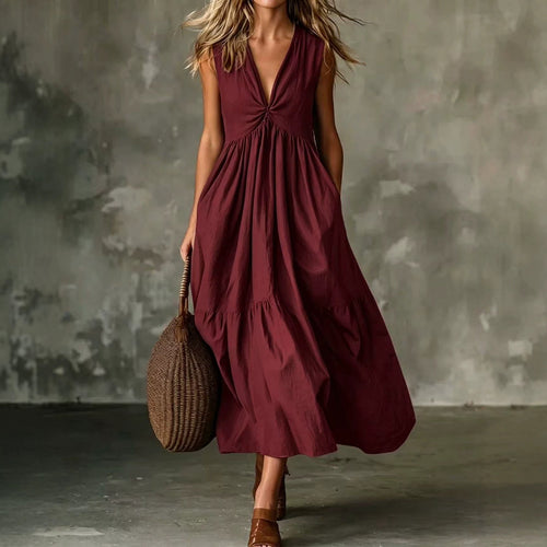 Robe longue texturée ample sans manches à col en V et devant torsadé avec poches