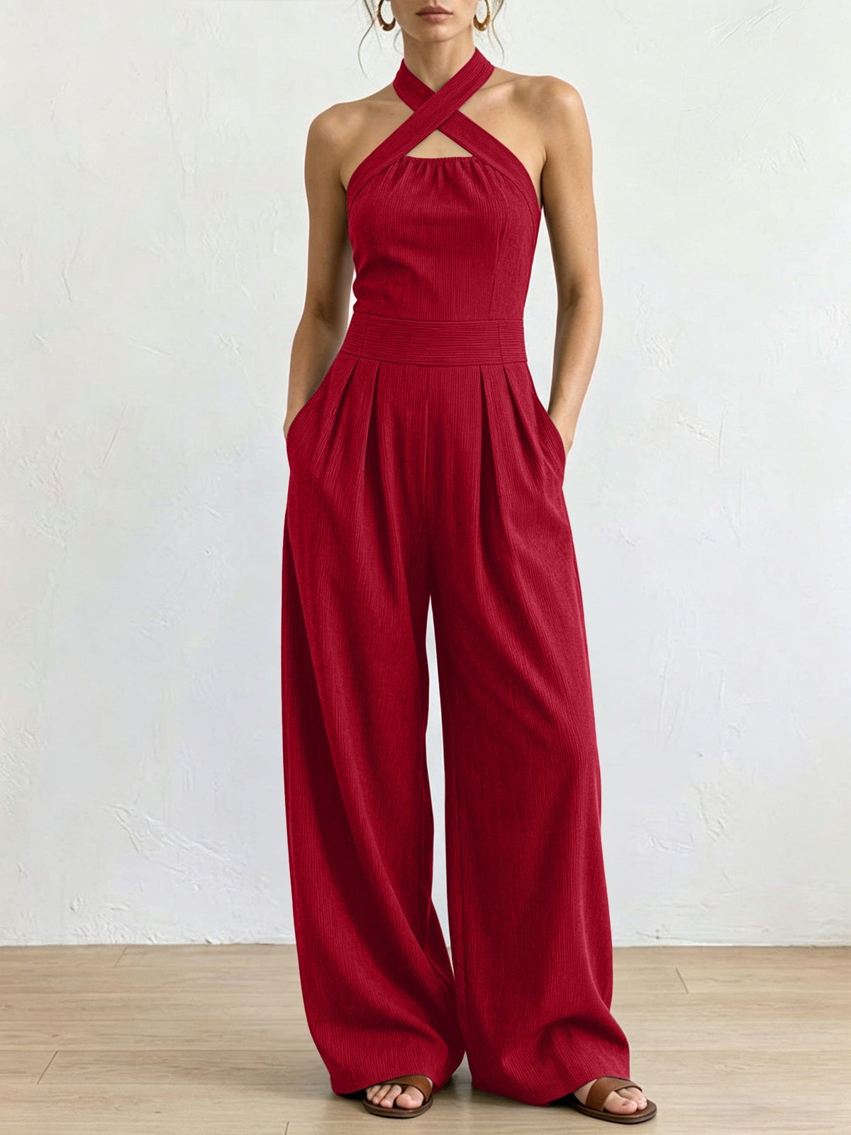 Combinaison pantalon dos nu entrecroisé à découpe et taille haute avec poches