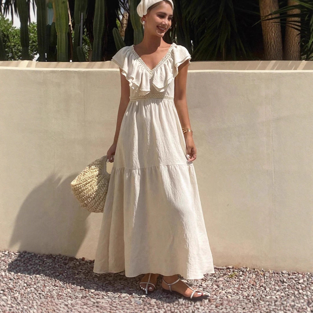 Robe longue maxi femme à col en V, manches volantées, coupe ample et étagée, idéale pour les vacances d'été.