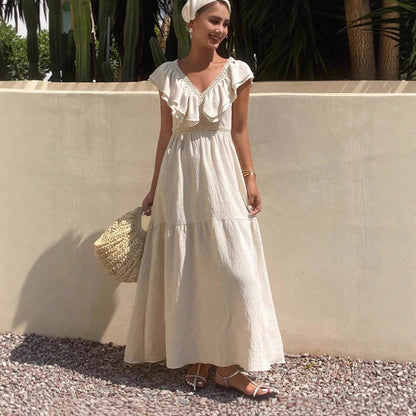 Robe longue maxi femme à col en V, manches volantées, coupe ample et étagée, idéale pour les vacances d'été.