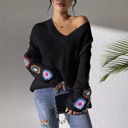 V-neck jumper with crochet flowers