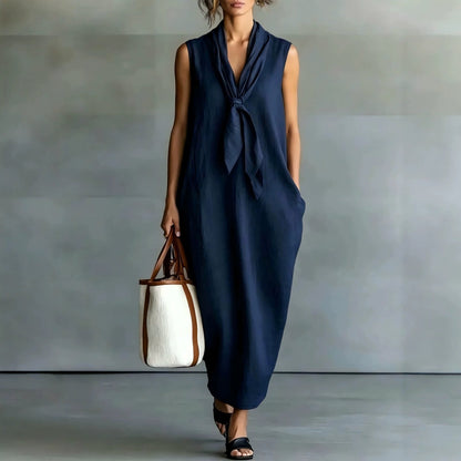 Robe trapèze mi-longue sans manches en lin beige naturel à nouer sur le devant