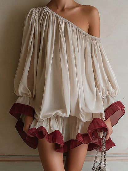 Mini-robe asymétrique à manches ballon et ourlet à volants contrastants