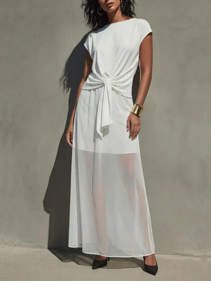 Robe longue élégante semi-transparente torsadée blanche