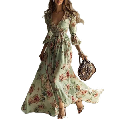 Robe longue fluide à imprimé floral, col en V et manches 3/4 à volants
