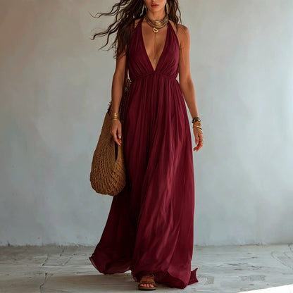 Robe longue en mousseline fluide avec col licou, décolleté en V profond et taille empire froncée