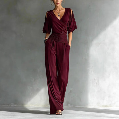Combinaison pantalon drapée à épaules dénudées avec taille froncée et jambes larges