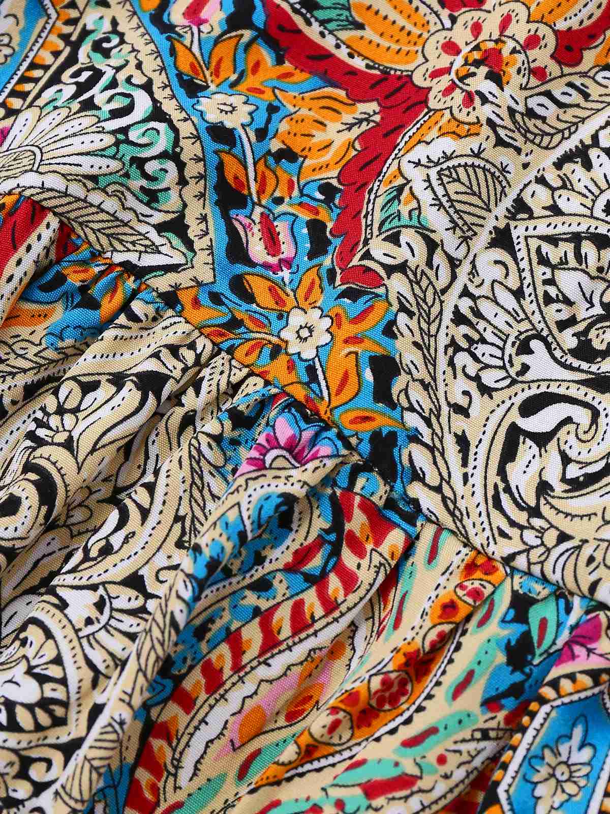 Bohemian dress with paisley and floral patterns, bell sleeves